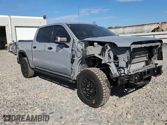 ✅ 2025 GMC Sierra 1500 AT4X • VIN: 3GTUUFEL6SG142489 • Лот: 82384575. Опубликован ранее на Copart с пробегом 21 698 миль. Бесплатный доступ к архиву аукционных продаж из США и подробный отчёт об истории автомобиля на DreamBid. Изображение 14.