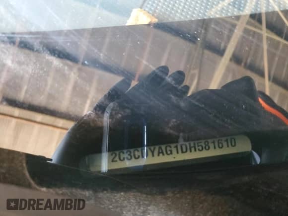 2013 Dodge Challenger SXT with VIN 2C3CDYAG1DH581610, listed as a Copart auction lot 89675765 with 186,456 mi miles and Salvage title. Bid and sale history available at DreamBid. Image 12.