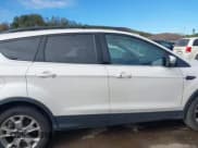 ✅ 2013 Ford Escape SEL • VIN: 1FMCU9H9XDUB07740 • Lot: 43454106. Listed on IAAI with 112,385 mi. Free auction sales archive from the USA and detailed vehicle history report at DreamBid. Image 13.