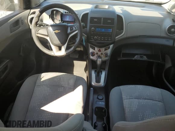 ✅ 2015 Chevrolet Sonic LS • VIN: 1G1JA6SH7F4136790 • Lot: 83853625. Listed on Copart with 129,316 mi. Free auction sales archive from the USA and detailed vehicle history report at DreamBid. Image 8.