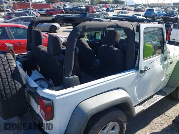 ✅ 2015 Jeep Wrangler Willys Wheeler • VIN: 1C4AJWAG1FL636417 • Lot: 43704796. Listed on IAAI with 81,914 mi. Free auction sales archive from the USA and detailed vehicle history report at DreamBid. Image 6.