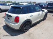 ✅ 2016 MINI Hardtop 4 Door • VIN: WMWXU1C50G2D08848 • Lot: 42215256. Listed on IAAI with 102,643 mi. Free auction sales archive from the USA and detailed vehicle history report at DreamBid. Image 4.