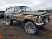 ✅ 1989 Jeep Grand Wagoneer • VIN: 1J4GS5872KP100998 • Lot: 58515245. Listed on Copart with 193,355 mi. Free auction sales archive from the USA and detailed vehicle history report at DreamBid. Image 4.