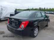 ✅ 2016 Chevrolet Sonic LS • VIN: 1G1JA5SG2G4116997 • Lot: 42303709. Listed on IAAI with 55,766 mi. Free auction sales archive from the USA and detailed vehicle history report at DreamBid. Image 4.