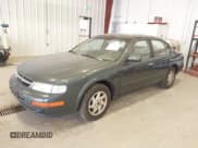 ✅ 1997 Nissan Maxima GXE • VIN: JN1CA21D3VT852052 • Lot: 42811019. Listed on IAAI with 172,430 mi. Free auction sales archive from the USA and detailed vehicle history report at DreamBid. Image 2.