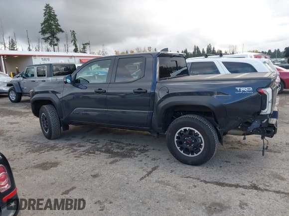 ✅ 2024 Toyota Tacoma TRD Sport • VIN: 3TMLB5JN3RM052733 • Lot: 43736927. Listed on IAAI with 10,142 mi. Free auction sales archive from the USA and detailed vehicle history report at DreamBid. Image 15.