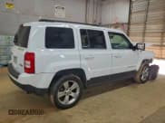 ✅ 2014 Jeep Patriot Latitude • VIN: 1C4NJRFB5ED784241 • Lot: 94932145. Listed on Copart with Not provided. Free auction sales archive from the USA and detailed vehicle history report at DreamBid. Image 3.