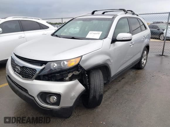 ✅ 2012 Kia Sorento EX • VIN: 5XYKU4A20CG209015 • Lot: 43748458. Listed on IAAI with 144,112 mi. Free auction sales archive from the USA and detailed vehicle history report at DreamBid. Image 12.
