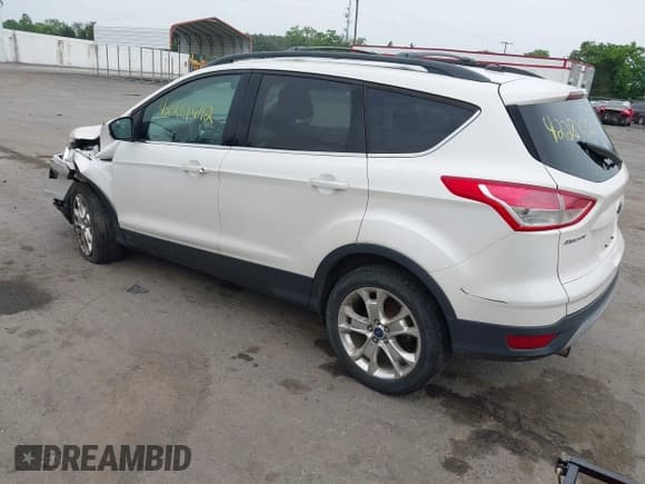 ✅ 2013 Ford Escape SE • VIN: 1FMCU9G94DUA45916 • Lot: 42281692. Listed on IAAI with 207,609 mi. Free auction sales archive from the USA and detailed vehicle history report at DreamBid. Image 3.