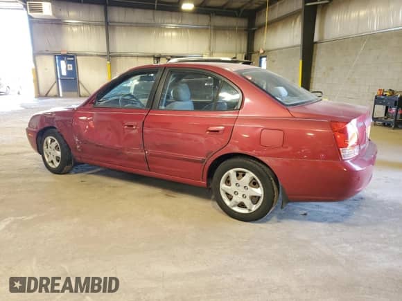 2006 Hyundai Elantra GLS with VIN KMHDN46D16U324883, listed as a Copart auction lot 84821305 with 59,301 mi miles and Salvage title. Bid and sale history available at DreamBid. Image 2.