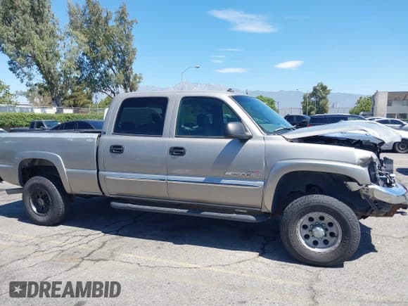 ✅ 2003 GMC Sierra 2500HD SLT • VIN: 1GTHK231X3F243264 • Лот: 42606442. Опубликован ранее на IAAI с пробегом 166 770 миль. Бесплатный доступ к архиву аукционных продаж из США и подробный отчёт об истории автомобиля на DreamBid. Изображение 13.