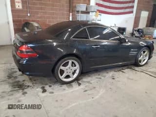 ✅ 2005 Mercedes-Benz SL 55 AMG • VIN: WDBSK74F35F096977 • Лот: 93538545. Опубликован ранее на Copart с пробегом 98 932 миль. Бесплатный доступ к архиву аукционных продаж из США и подробный отчёт об истории автомобиля на DreamBid. Изображение 3.