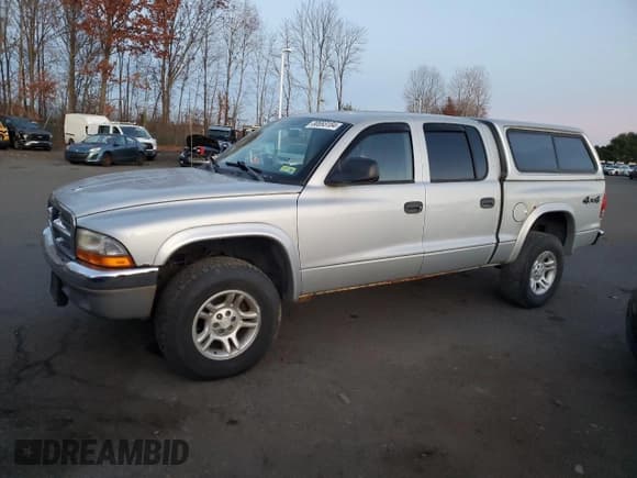 ✅ 2004 Dodge Dakota SLT • VIN: 1D7HG48K94S782682 • Lot: 80693184. Wystawiony na Copart z przebiegiem 70 896 mil. Bezpłatny archiwum sprzedaży aukcyjnych z USA i szczegółowy raport historii pojazdu na DreamBid. Zdjęcie 1.