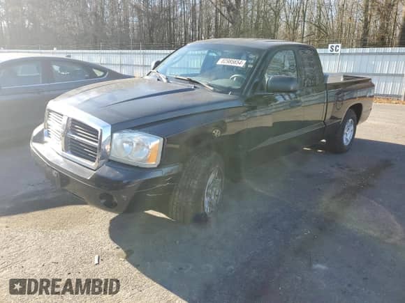 ✅ 2006 Dodge Dakota SLT • VIN: 1D7HW42K46S524262 • Лот: 82985654. Размещён на Copart с пробегом 124 170 миль миль. Получите бесплатный доступ к архиву аукционных продаж из США и посмотрите подробный отчёт об истории автомобиля на DreamBid. Изображение 1.