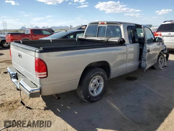1998 Dodge Dakota SLT с VIN 1B7GL22XXWS651578, выставлен на аукционе Copart как лот 76149304 с пробегом 142 433 миль миль и Списание • Salvage title. История ставок и продаж доступна на DreamBid. Изображение 3.