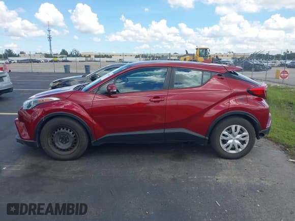 ✅ 2019 Toyota C-HR XLE • VIN: NMTKHMBX3KR092173 • Lot: 43008852. Listed on IAAI with 23,541 mi. Free auction sales archive from the USA and detailed vehicle history report at DreamBid. Image 14.
