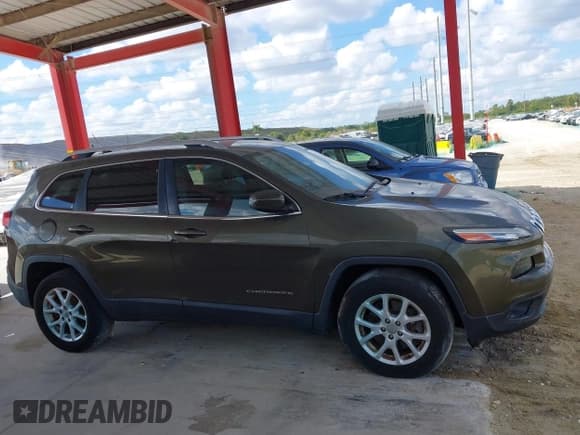 ✅ 2015 Jeep Cherokee Latitude • VIN: 1C4PJMCS8FW559172 • Lot: 43681804. Listed on IAAI with 35,998 mi. Free auction sales archive from the USA and detailed vehicle history report at DreamBid. Image 14.