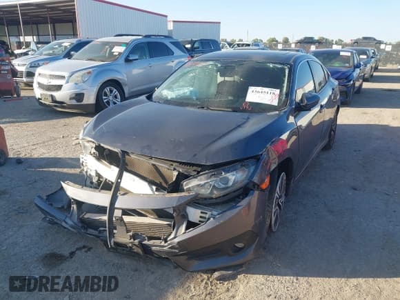 ✅ 2018 Honda Civic EX-T • VIN: JHMFC1F37JX038034 • Lot: 43645118. Listed on IAAI with 144,999 mi. Free auction sales archive from the USA and detailed vehicle history report at DreamBid. Image 2.