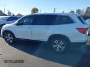 ✅ 2018 Honda Pilot EX-L • VIN: 5FNYF5H52JB016461 • Lot: 43625359. Wystawiony na IAAI z przebiegiem 164 073 mil. Bezpłatny archiwum sprzedaży aukcyjnych z USA i szczegółowy raport historii pojazdu na DreamBid. Zdjęcie 14.
