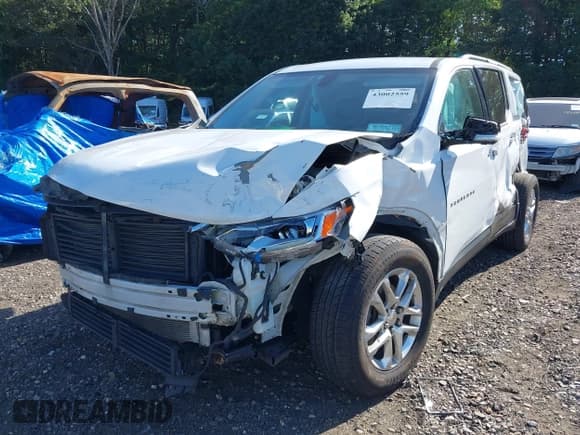✅ 2019 Chevrolet Traverse LT • VIN: 1GNEVHKW8KJ148165 • Lot: 43002559. Wystawiony na IAAI z przebiegiem 91 583 mil. Bezpłatny archiwum sprzedaży aukcyjnych z USA i szczegółowy raport historii pojazdu na DreamBid. Zdjęcie 17.