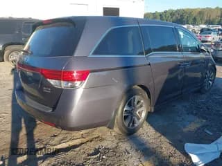 ✅ 2015 Honda Odyssey Touring Elite • VIN: 5FNRL5H97FB027012 • Лот: 43453561. Опубликован ранее на IAAI с пробегом 152 921 миль. Бесплатный доступ к архиву аукционных продаж из США и подробный отчёт об истории автомобиля на DreamBid. Изображение 4.