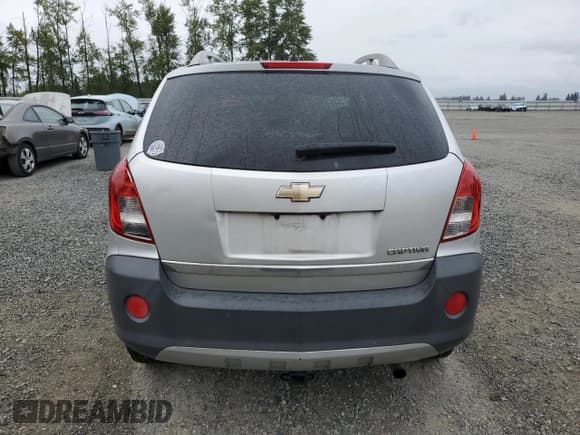 ✅ 2013 Chevrolet Captiva Sport LS • VIN: 3GNAL2EK4DS603251 • Lot: 57487535. Wystawiony na Copart z przebiegiem 244 329 mil. Bezpłatny archiwum sprzedaży aukcyjnych z USA i szczegółowy raport historii pojazdu na DreamBid. Zdjęcie 6.