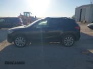 ✅ 2014 Mazda CX-5 Grand Touring • VIN: JM3KE2DY7E0345255 • Lot: 43668720. Listed on IAAI with 270,412 mi. Free auction sales archive from the USA and detailed vehicle history report at DreamBid. Image 14.