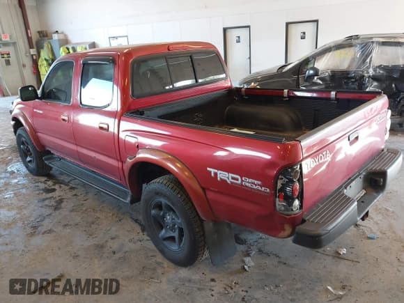 ✅ 2001 Toyota Tacoma PreRunner • VIN: 5TEGN92N71Z847242 • Lot: 43331240. Listed on IAAI with 220,186 mi. Free auction sales archive from the USA and detailed vehicle history report at DreamBid. Image 3.