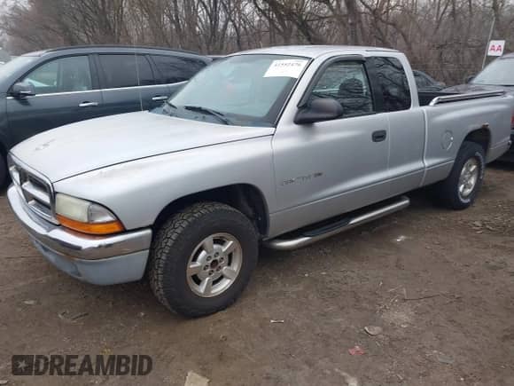 2002 Dodge Dakota SLT с VIN 1B7GL42N42S504550, выставлен на аукционе IAAI как лот 41552476 с пробегом 162 325 миль миль и . История ставок и продаж доступна на DreamBid. Изображение 2.