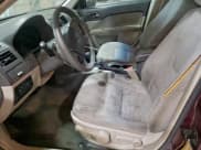 ✅ 2011 Ford Fusion S • VIN: 3FAHP0GAXBR260203 • Лот: 93601985. Опубликован ранее на Copart с пробегом 215 661 миль. Бесплатный доступ к архиву аукционных продаж из США и подробный отчёт об истории автомобиля на DreamBid. Изображение 7.