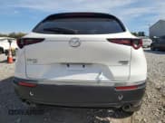 ✅ 2024 Mazda CX-30 Premium • VIN: 3MVDMBDY8RM617818 • Лот: 87295895. Опубликован ранее на Copart с пробегом Не указан. Бесплатный доступ к архиву аукционных продаж из США и подробный отчёт об истории автомобиля на DreamBid. Изображение 6.