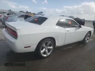 ✅ 2012 Dodge Challenger SXT • VIN: 2C3CDYAG6CH292897 • Lot: 78373494. Wystawiony na Copart z przebiegiem 154 703 mil. Bezpłatny archiwum sprzedaży aukcyjnych z USA i szczegółowy raport historii pojazdu na DreamBid. Zdjęcie 3.