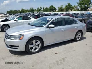 ✅ 2013 Volkswagen Passat SE • VIN: 1VWBH7A34DC002337 • Lot: 64510725. Listed on Copart with 143,150 mi. Free auction sales archive from the USA and detailed vehicle history report at DreamBid. Image 1.