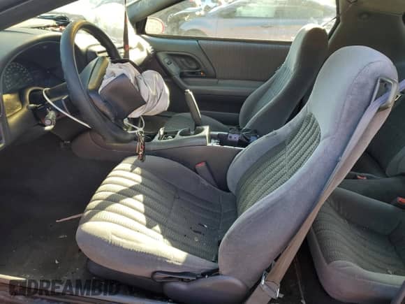 1999 Chevrolet Camaro z VIN 2G1FP22K7X2118595, wystawiony jako Copart lot #48475125 z przebiegiem Nie podano mil oraz Szkoda całkowita • Salvage title. Historia ofert i sprzedaży dostępna na DreamBid. Obrazek 7.