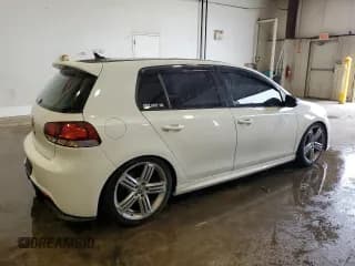 ✅ 2012 Volkswagen Golf R w/Sunroof & Navi • VIN: WVWPF7AJXCW274997 • Лот: 60323145. Опубликован ранее на Copart с пробегом 155 697 миль. Бесплатный доступ к архиву аукционных продаж из США и подробный отчёт об истории автомобиля на DreamBid. Изображение 3.