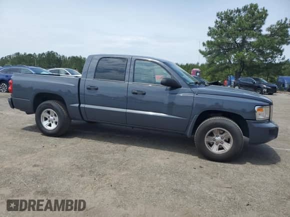 2008 Dodge Dakota SLT с VIN 1D7HE48K68S501871, выставлен на аукционе Copart как лот 54688015 с пробегом 152 712 миль миль и Списание • Salvage title. История ставок и продаж доступна на DreamBid. Изображение 4.