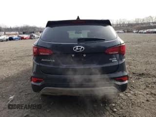 ✅ 2017 Hyundai Santa Fe 2.4L • VIN: 5XYZUDLB2HG460993 • Лот: 41114733. Опубликован ранее на Copart с пробегом 79 861 миль. Бесплатный доступ к архиву аукционных продаж из США и подробный отчёт об истории автомобиля на DreamBid. Изображение 6.