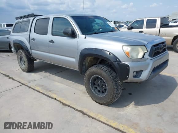 ✅ 2014 Toyota Tacoma PreRunner • VIN: 5TFJU4GN5EX056340 • Lot: 43012333. Wystawiony na IAAI z przebiegiem 192 752 mil. Bezpłatny archiwum sprzedaży aukcyjnych z USA i szczegółowy raport historii pojazdu na DreamBid. Zdjęcie 1.