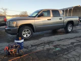 2009 Dodge Dakota z VIN 1D3HE38K09S818834, wystawiony jako Copart lot #88713675 z przebiegiem 152 083 mil mil oraz Szkoda całkowita • Salvage title. Historia ofert i sprzedaży dostępna na DreamBid. Obrazek 1.