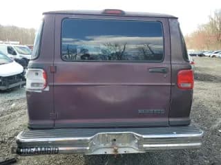 ✅ 1999 Dodge Passenger • VIN: 2B5WB35Z4XK558674 • Lot: 50013815. Listed on Copart with 140,979 mi. Free auction sales archive from the USA and detailed vehicle history report at DreamBid. Image 6.