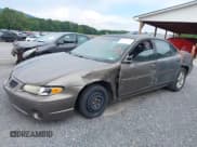 ✅ 2001 Pontiac Grand Prix SE • VIN: 1G2WK52J21F162657 • Лот: 42634127. Опубликован ранее на IAAI с пробегом 201 423 миль. Бесплатный доступ к архиву аукционных продаж из США и подробный отчёт об истории автомобиля на DreamBid. Изображение 6.