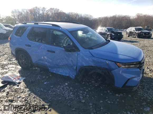 ✅ 2024 Honda Pilot TrailSport • VIN: 5FNYG1H6XRB023507 • Lot: 81461214. Listed on Copart with 12,036 mi. Free auction sales archive from the USA and detailed vehicle history report at DreamBid. Image 4.