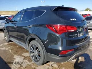 ✅ 2017 Hyundai Santa Fe Ultimate • VIN: 5XYZWDLA0HG425886 • Лот: 66363083. Опубликован ранее на Copart с пробегом 99 009 миль. Бесплатный доступ к архиву аукционных продаж из США и подробный отчёт об истории автомобиля на DreamBid. Изображение 2.