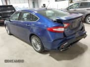 ✅ 2015 Ford Fusion Titanium • VIN: 3FA6P0D99FR128055 • Lot: 42887252. Listed on IAAI with 149,464 mi. Free auction sales archive from the USA and detailed vehicle history report at DreamBid. Image 3.