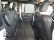 ✅ 2022 Jeep Wrangler Unlimited Sahara • VIN: 1C4JJXP62NW266791 • Lot: 64863535. Listed on Copart with 61,452 mi. Free auction sales archive from the USA and detailed vehicle history report at DreamBid. Image 10.