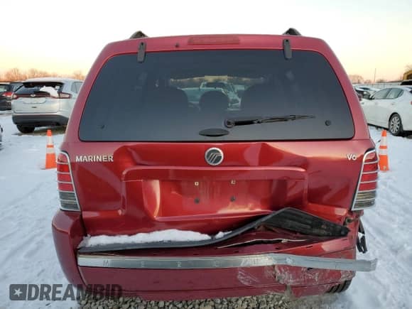 2006 Mercury Mariner Luxury with VIN 4M2YU56146DJ09769, listed as a Copart auction lot 87851795 with 80,894 mi miles and Salvage title. Bid and sale history available at DreamBid. Image 6.