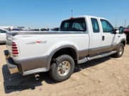 ✅ 1999 Ford F-250 XL • VIN: 1FTNX21F3XEE53588 • Lot: 64113385. Listed on Copart with 211,147 mi. Free auction sales archive from the USA and detailed vehicle history report at DreamBid. Image 3.