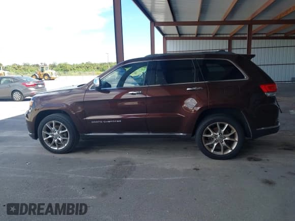 ✅ 2015 Jeep Grand Cherokee Summit • VIN: 1C4RJEJG2FC829205 • Lot: 43469676. Listed on IAAI with 89,893 mi. Free auction sales archive from the USA and detailed vehicle history report at DreamBid. Image 14.