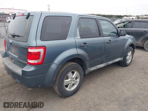 ✅ 2010 Ford Escape XLS • VIN: 1FMCU0C72AKB90895 • Lot: 43871945. Listed on IAAI with 224,602 mi. Free auction sales archive from the USA and detailed vehicle history report at DreamBid. Image 4.