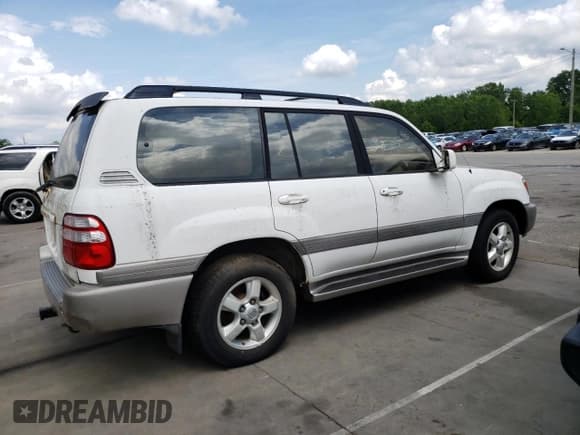 ✅ 2003 Toyota Land Cruiser • VIN: JTEHT05J032049652 • Лот: 64979325. Опубликован ранее на Copart с пробегом Не указан. Бесплатный доступ к архиву аукционных продаж из США и подробный отчёт об истории автомобиля на DreamBid. Изображение 3.